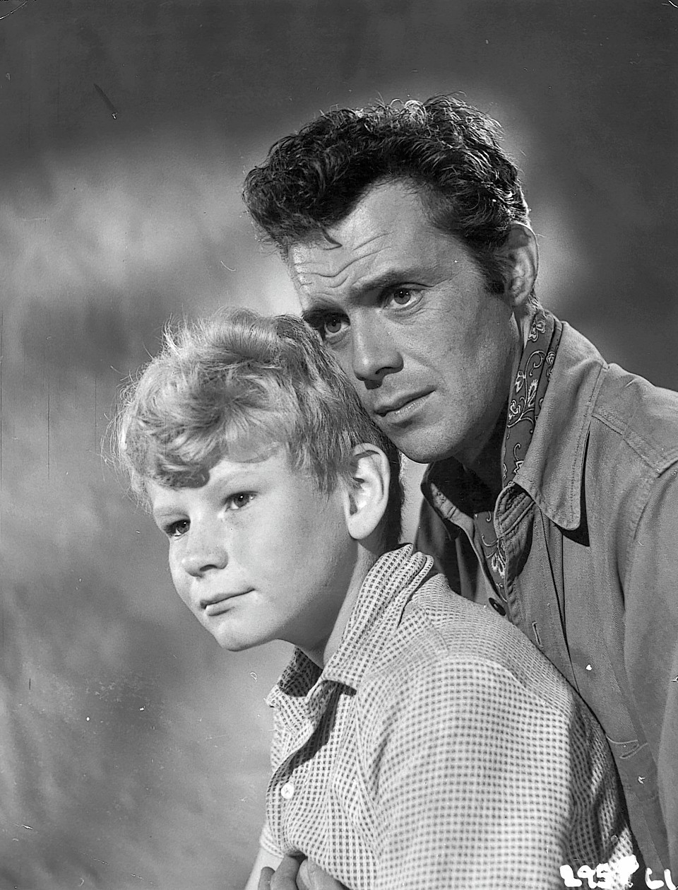 A young Jon Whiteley with Dirk Bogarde in The Spanish Gardener